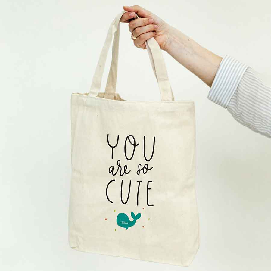 Alegre diseño con frase para regalar a los invitados a un bautizo. Bolsa de tela para regalar en bautizo.